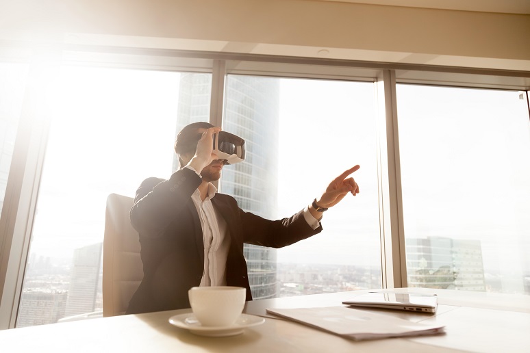 Business person wearing VR headset